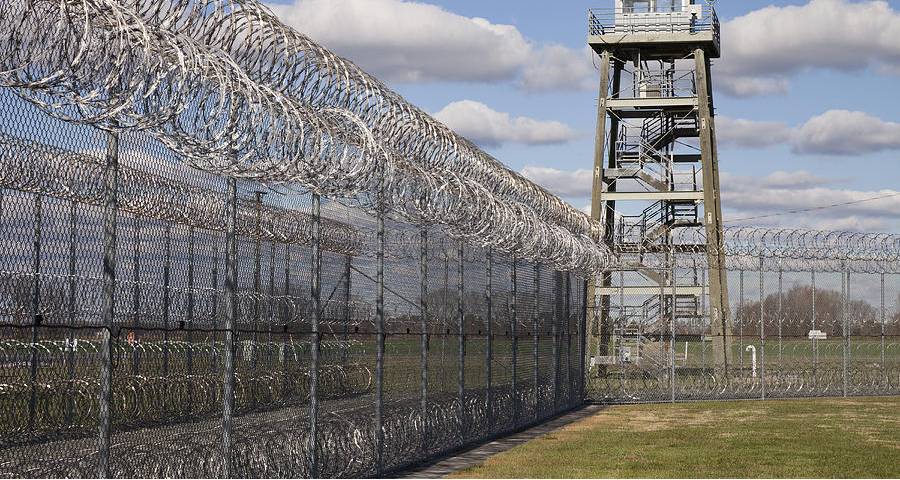 Prison fence consists of razor chain link fence and razor wires.