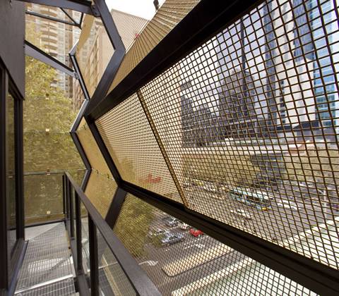 Metal shop mesh facade