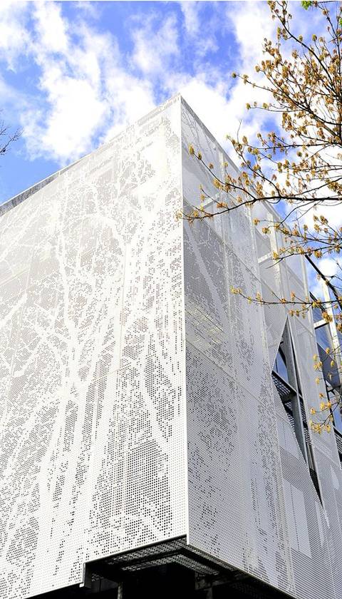 A building with perforated metal to make a exterior.