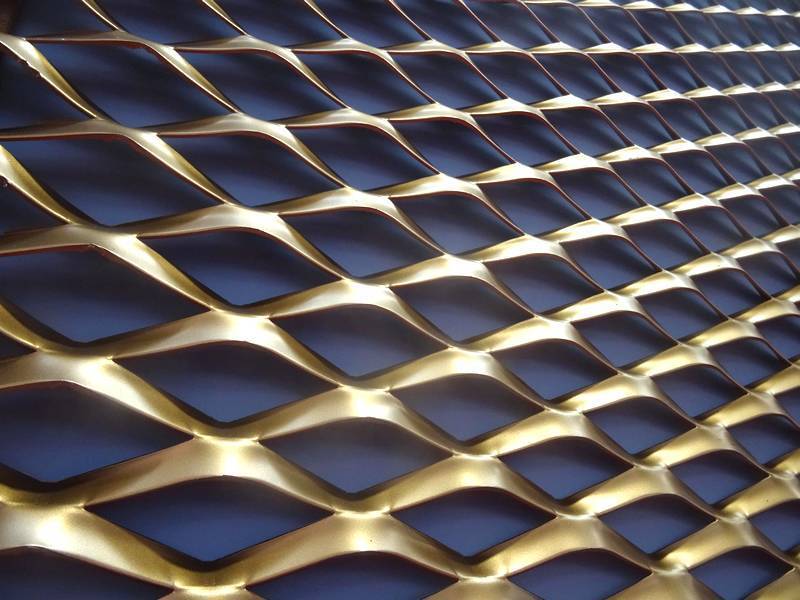 This is part of decorative expanded metal sheet, its colour is antique brass.