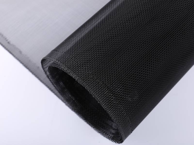 A roll of black aluminum window screen.