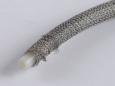 A round knitted wire mesh gasket with elastomer core.
