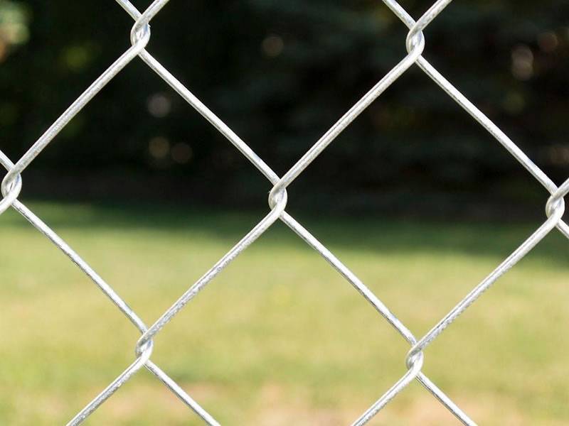 This is one part of galvanized chain link fabric, with wires interlocking with each other.