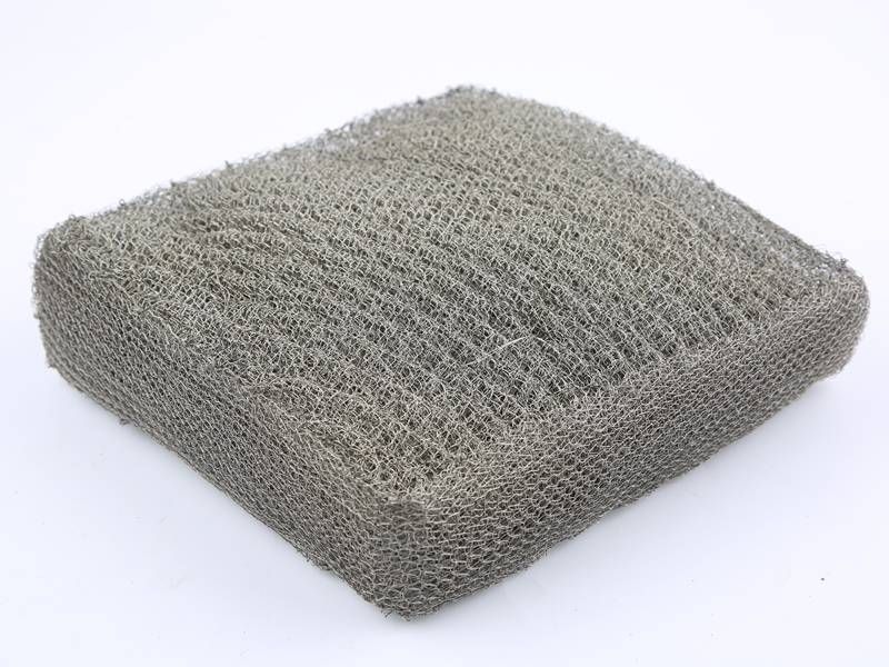 Knitted wire mesh filter panel without metal grilles.