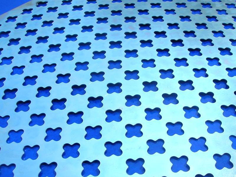 A part of perforated metal sheet to show decorative hole detail.