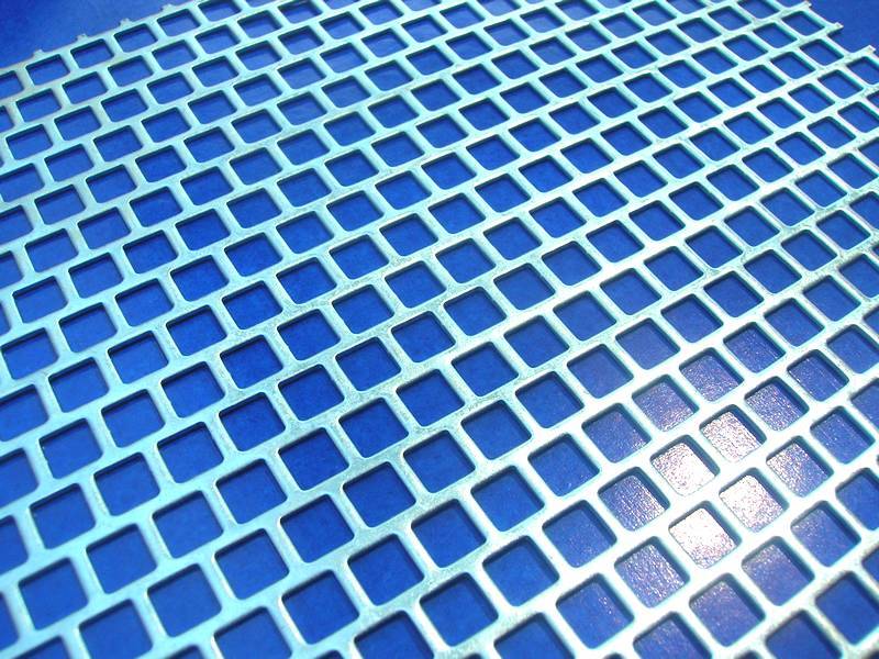 A part of perforated metal sheet to show square hole detail.