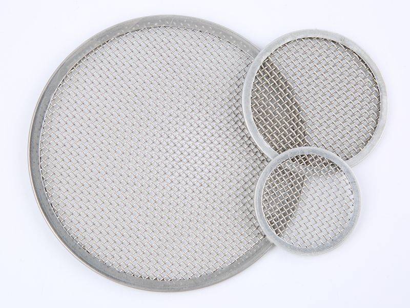 There are three rimmed filter discs constructed of single layer of woven wire mesh, and they three have different sizes.