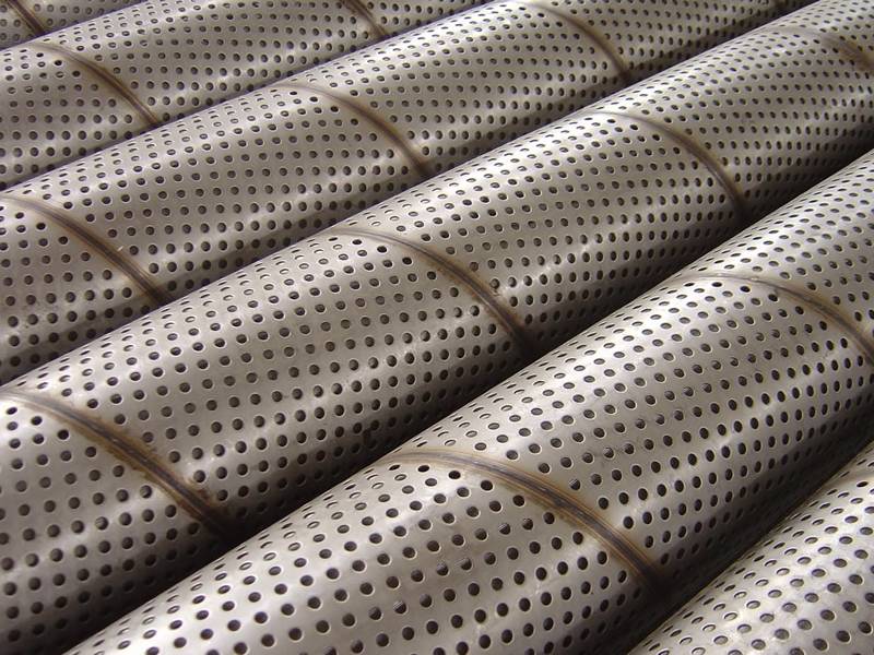 Spiral welded perforated pipes with round holes.