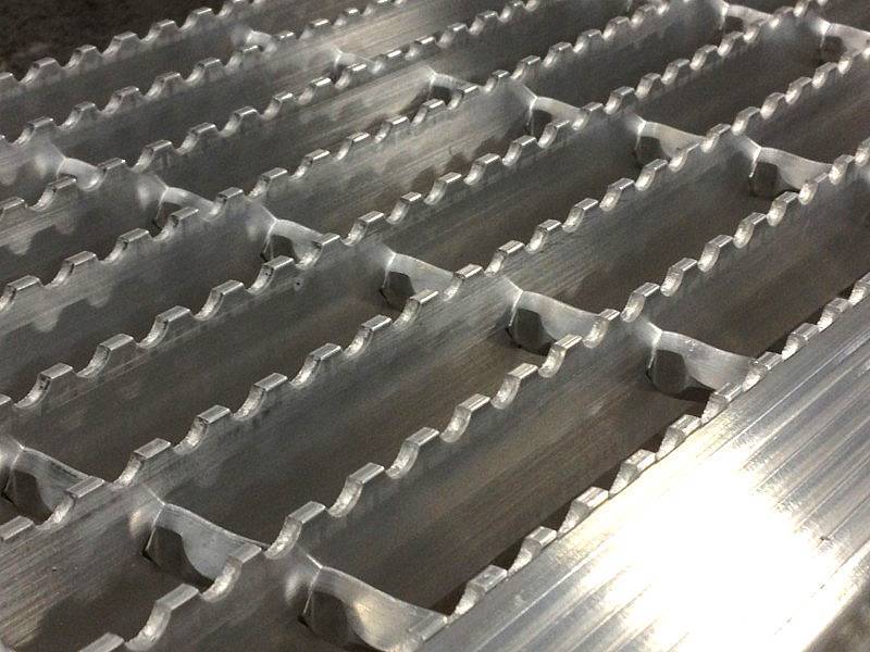 There is a swage locked grating with high strength and the serrated surface for anti-slide effect.