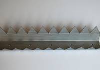 Part picture of U channel razor spikes.