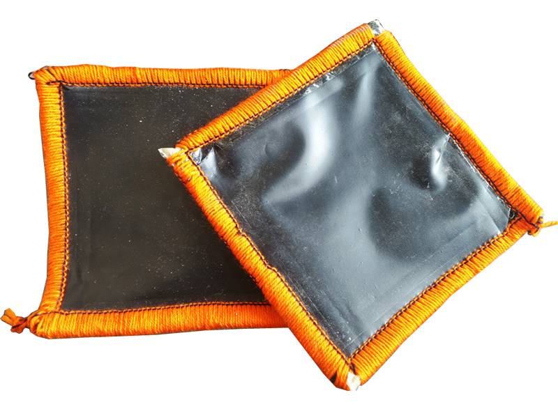 There are two pieces of film waterproof blankets with orange edge.