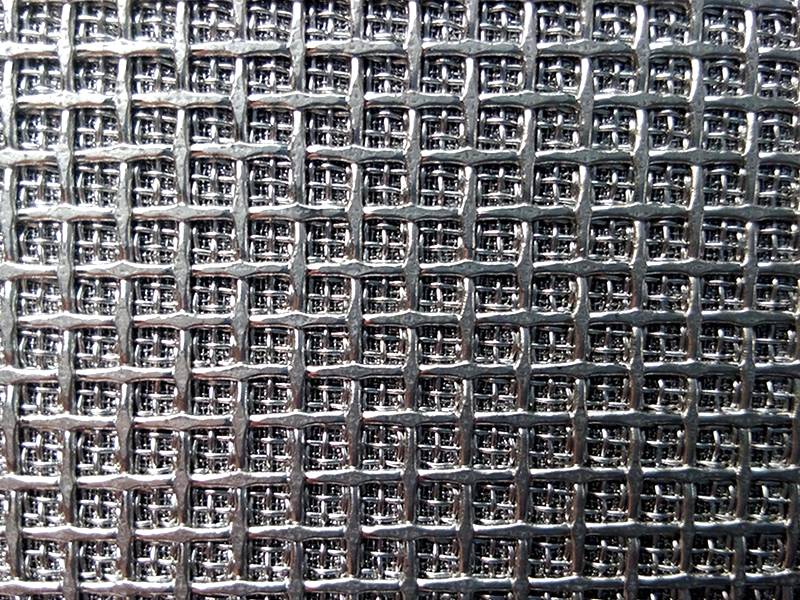 A piece of rectangular woven sintered wire mesh.