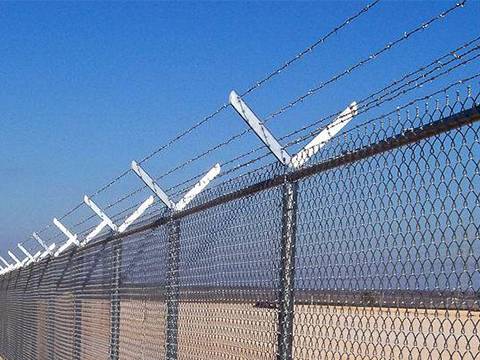 Add barbed wire at the top of chain link fence.